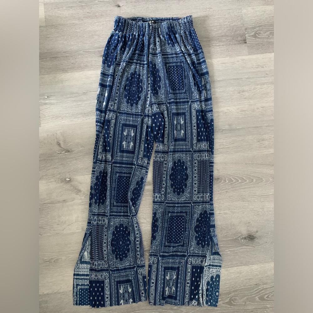 Pleated high waisted trousers